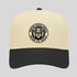 Beige and black cap with a pickleball logo on a light gray background